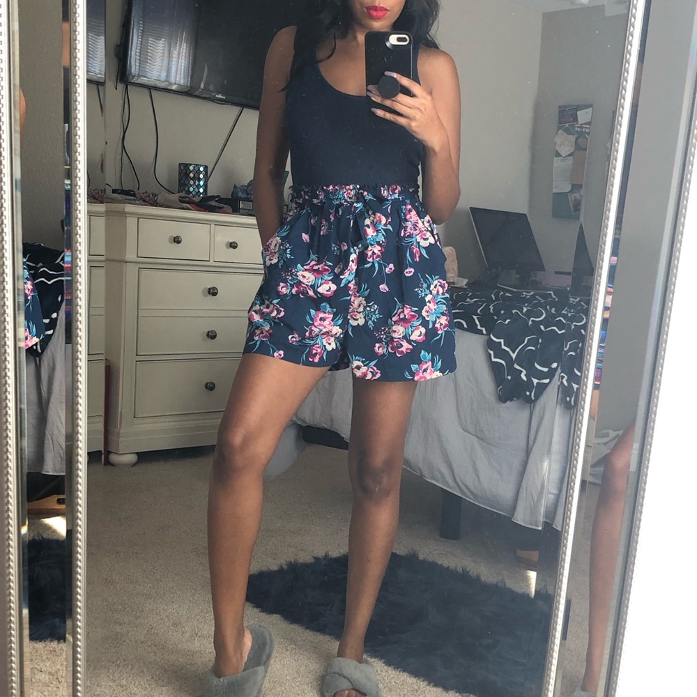 Blue Romper with flower patterns